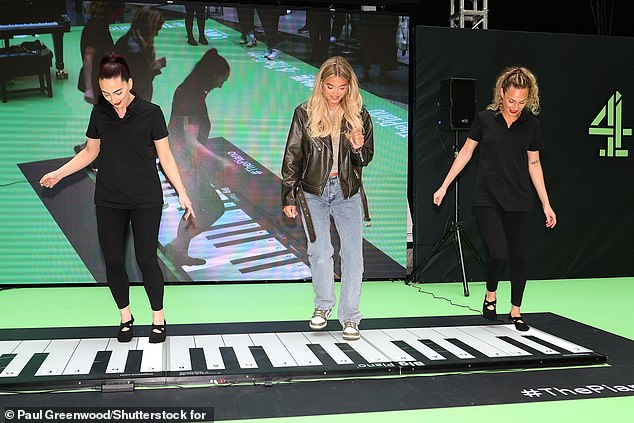 Molly and two dancers stood on a keyboard projected on the floor and tried to step on the keys that were shouted out.