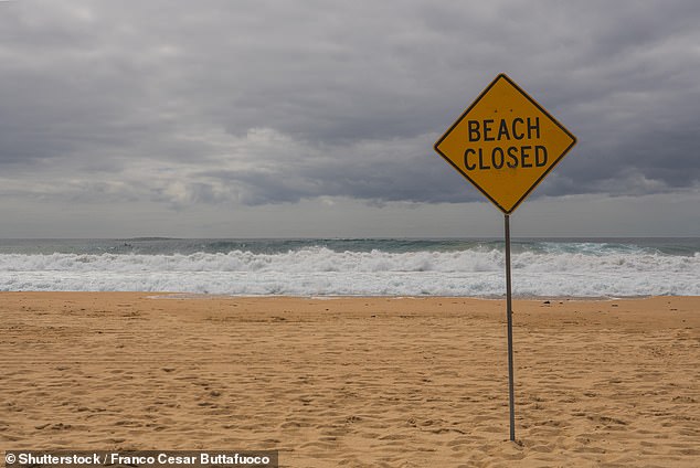 24 shark sightings have been reported off Western Australian beaches to the state government's SharkSmart website in the last 24 hours (file image of a closed beach)