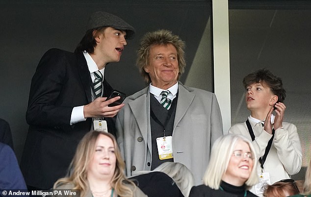 He was joined by his rarely seen sons Alastair, 18, and Aiden, 12, and the trio were seen in the stands intently watching the match with their dad.