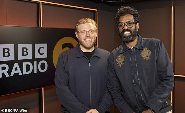 Romesh was presented with a giraffe costume that his first celebrity guest, Rob Beckett (left), wore during Sunday's London Marathon on his new BBC Radio 2 show.