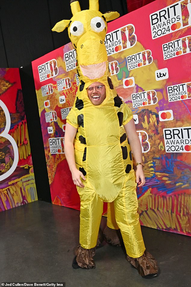 Rob's upcoming stand-up tour is called Giraffe and to promote it he wore an inflatable giraffe costume at the Brit Awards last month (pictured).