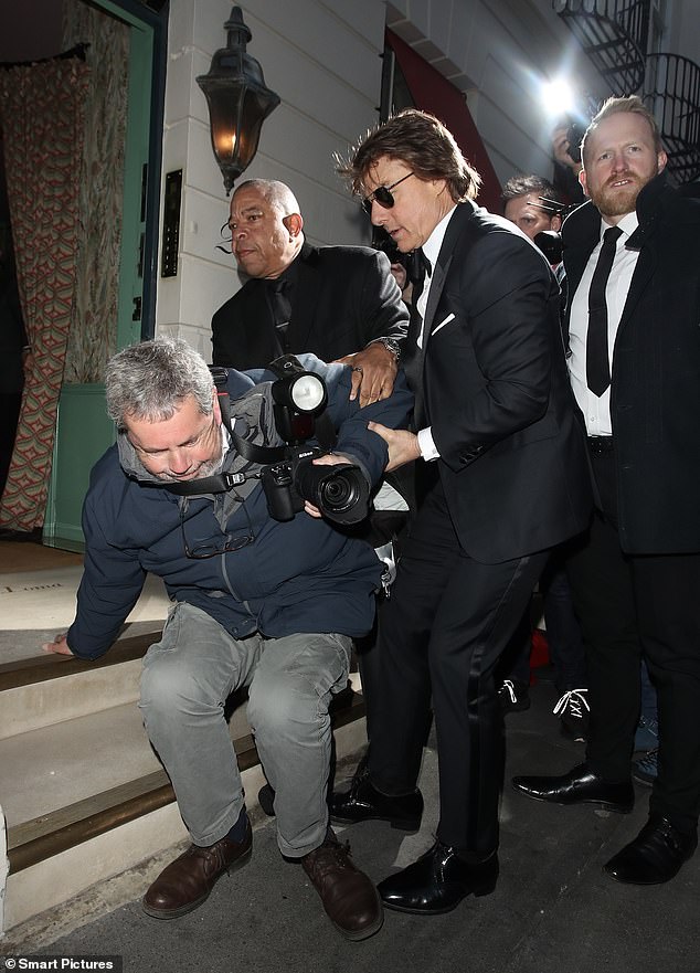 Mission: Impossible Legend Tom's arrival caused a lot of excitement outside the exclusive venue and as fans and photographers struggled to get his attention, the man fell.