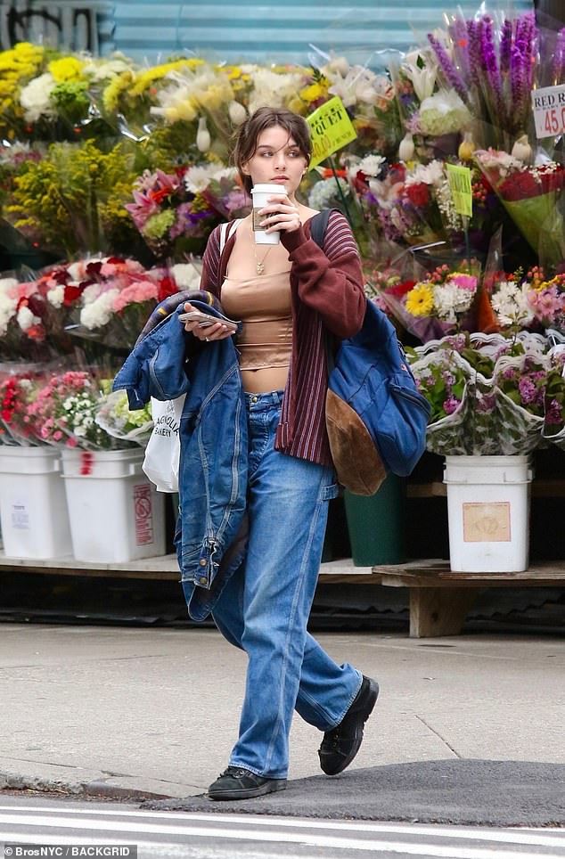 Suri looked the spitting image of her mother from her Dawson's Creek days when she stepped out on her 18th birthday, while her estranged father Tom was in the UK.