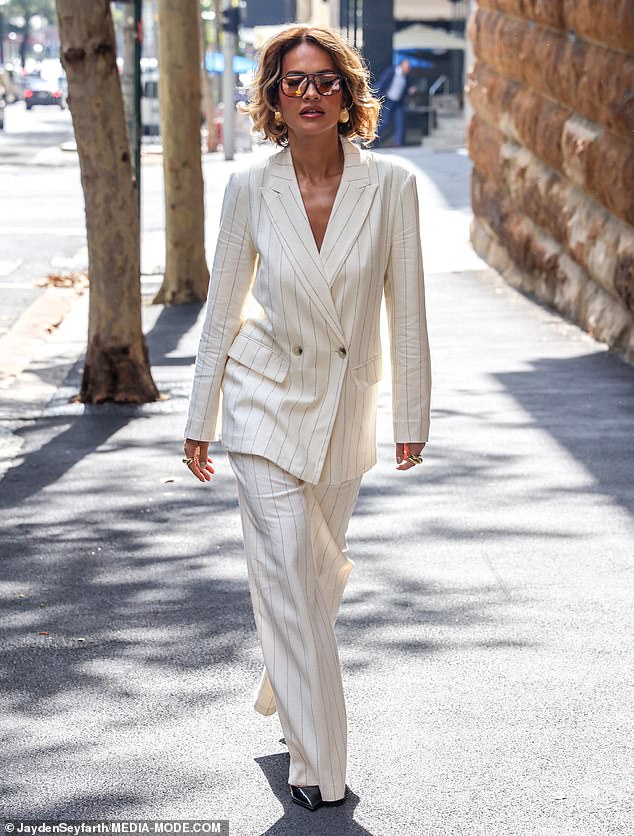 The British pop icon, 33, turned heads in a stunning and affordable white striped suit, a highlight of her much-praised collection with Primark.