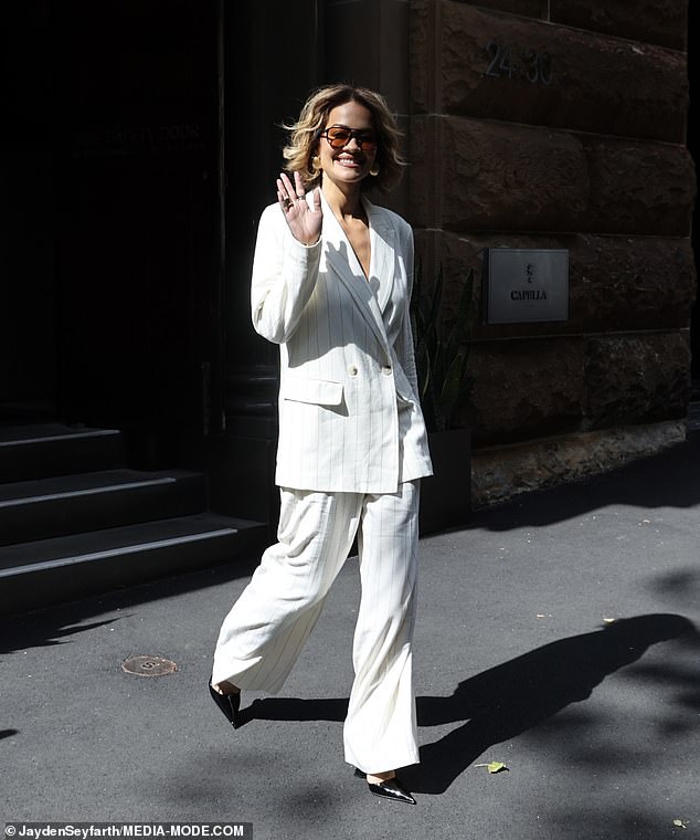 Her custom-made two-piece ensemble worth $95 AUD (£50.00) hit all the right places, accentuating her figure with its sharp cuts and clean lines.