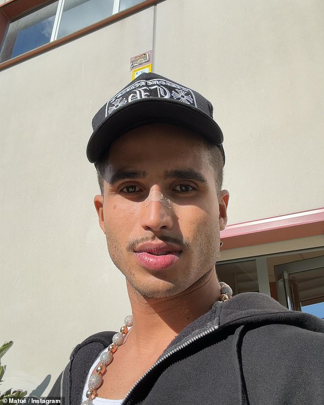 The sudden surge in attention came after Chapman's followers pointed out that he bears a striking resemblance to the Brazilian rapper (pictured), whose real name is Matheus Brasileiro Aguiar.