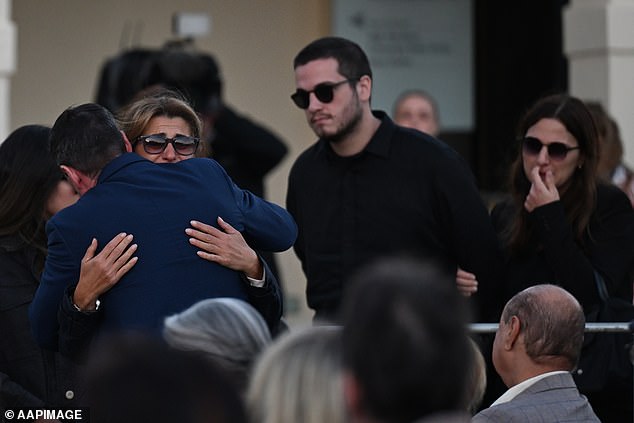 Sunday's vigil, organized by the state government and Waverley Council, was attended by hundreds of mourners.
