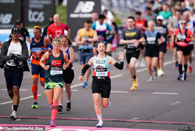 Runners cross the start line of the London Marathon on Sunday morning