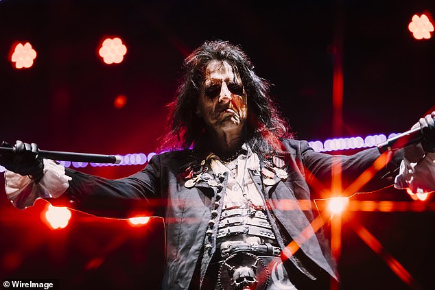 Alice Cooper, 76, (pictured) wowed the crowd with her signature top hat and dramatic makeup.