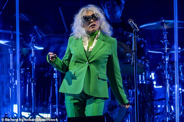 Deborah Harry, 78, (pictured) frontwoman of US band Blondie, also took to the stage over the weekend in an electric green suit.