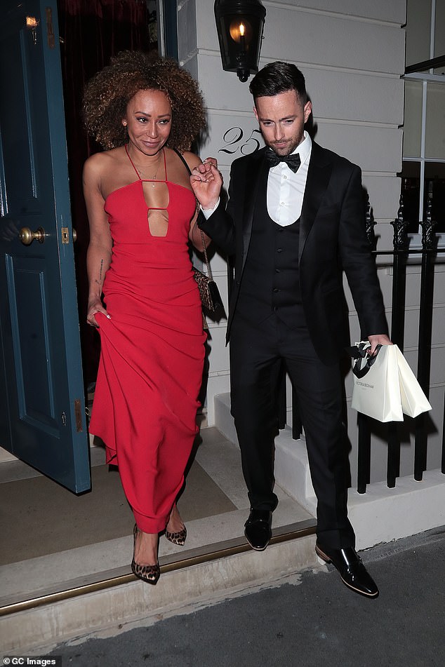 It is understood £3,000 bottles of Posh Spice's favorite Chateau Mouton Rothschild were served, along with £500 bottles of champagne (Mel B and Rory McPhee pictured).