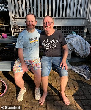 Chris and his father Jim after Chris's epic weight loss
