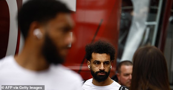 Liverpool's Egyptian number 11 striker Mohamed Salah arrives before the English Premier League football match between Fulham and Liverpool at Craven Cottage in London on April 21, 2024. (Photo by Benjamin CREMEL / AFP) (Photo by BENJAMIN CREMEL/AFP via Getty Images)