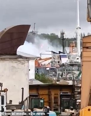 Video showed a fire allegedly on a ship in Sevastopol's Sukharnaya Bay after explosions were heard in the annexed Crimean naval port.