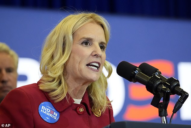 Kerry Kennedy, accompanied by members of the Kennedy family, speaks before President Joe Biden