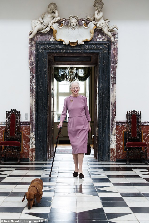 The second snapshot shows the former monarch walking across the monochromatic tiled floor of Fredensborg Castle, alongside her dachshund Tilia.
