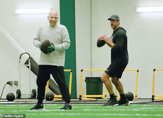 Rodgers throws a deep ball to receiver Garrett Wilson, to the delight of Jets fans