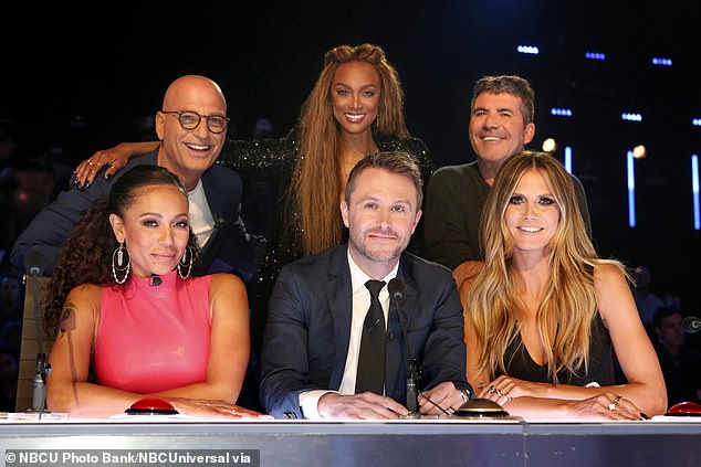 The supermodels had another fire of sorts when Banks joined the cast of America's Got Talent for two seasons starting in 2017;  They are pictured with her colleagues Howie Mandel, Simon Cowell, Mel B and Chris Hardwick.