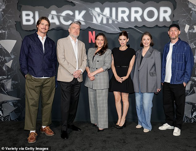 Black Mirror creator Josh, Charlie Brooker, Jessica Rhoades, Kate, Abigail Scollay and Stuart Bentley posed for a group photo.