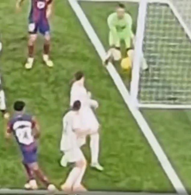 However, a new angle to the incident emerged where Yamal's shot (below left) appeared to have crossed the line, with the Real Lunin goalkeeper pushing the ball away behind the line.