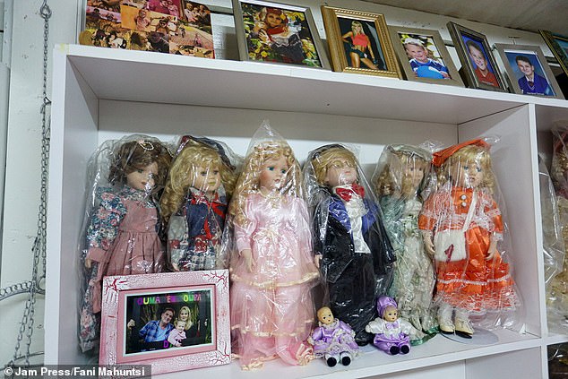 The mother of four wraps each of her dolls in plastic to ensure they remain in perfect condition.