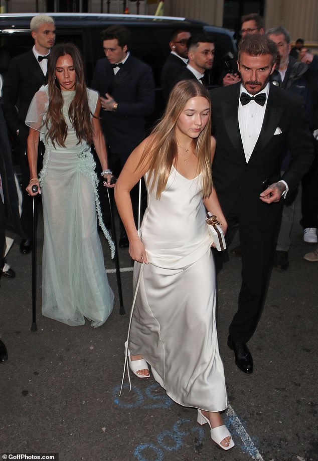 Victoria was seen arriving at her party using canes after breaking her foot at the gym in February.