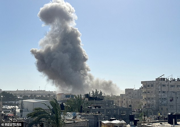 Smoke rises following Israeli strikes, amid the ongoing conflict between Israel and Hamas, in Rafah, southern Gaza Strip, April 21, 2024.