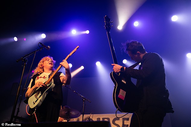 Karla Chubb (L) and Sam McCann (R) of Sprints perform at the Olympia Theater in Dublin on December 12, 2023.