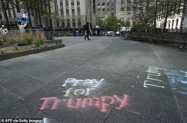 Trump supporters wrote messages outside the courthouse