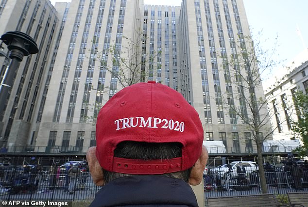 A Trump supporter outside Manhattan Criminal Court in New York City on April 22, 2024.