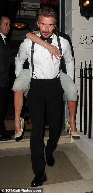 Victoria stood her ground as the couple left members-only club Oswalds in London's Mayfair.