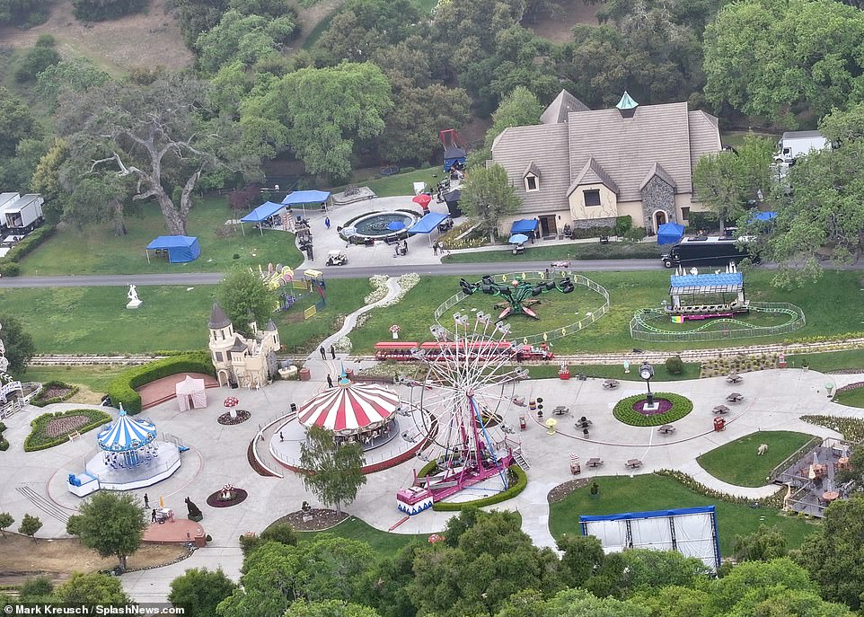 Ariel's photos reveal that the fairground rides, tents and children's trains that Neverland became known for have been carefully rebuilt, along with a Ferris wheel and a replica of Jackson's carousel.