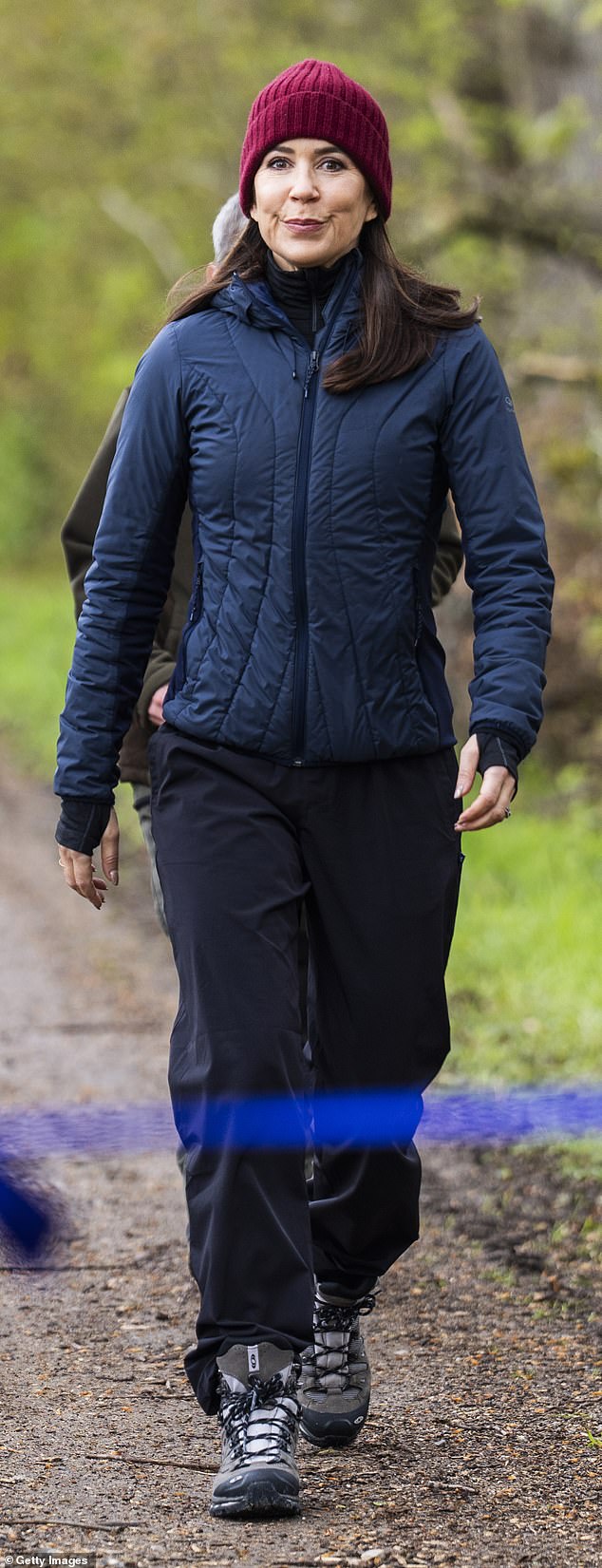 The royal paired her hiking gear with a trendy maroon knit hat, ideal for the current climate.