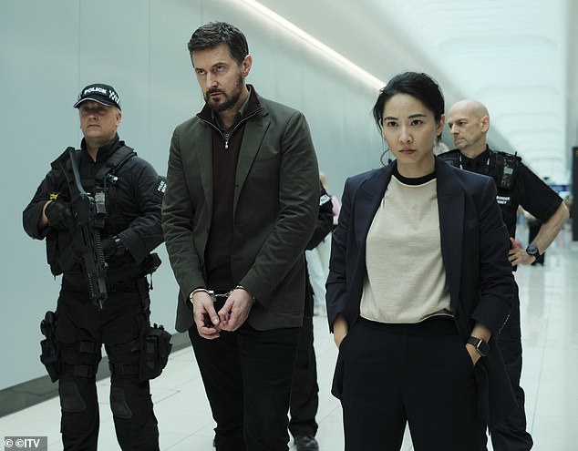 London detective Hana Li (Jing) is assigned the task of escorting Dr. Nolan back to Beijing immediately on a red-eye flight.