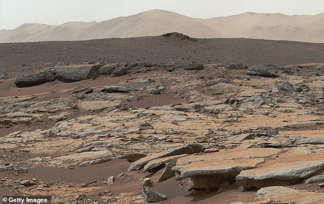 The rocky floor surface of Gale Crater traps methane beneath, but Curiosity may be releasing it when it breaks through the crust.