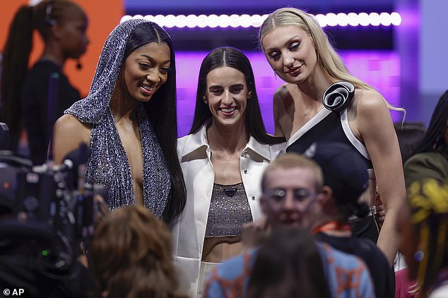 From left, LSU's Angel Reese, Iowa's Caitlin Clark and Stanford's Cameron Brink pose for a photo before the WNBA basketball draft.