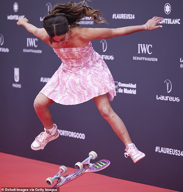 Trew (pictured on the red carpet at the Laureus Awards in Madrid) became the first skater to land a 720 in 2023 at just 13 years old.