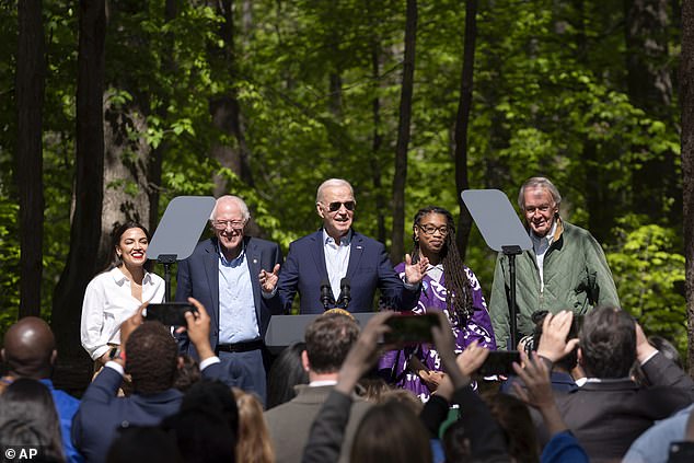 President Joe Biden (center) at an Earth Day event at Prince William Forest Park in Triangle, Virginia along with (from left) Rep. Alexandria Ocasio-Cortez, Sen. Bernie Sanders, Za¿Nyia Kelly, and Sen. Ed Markey