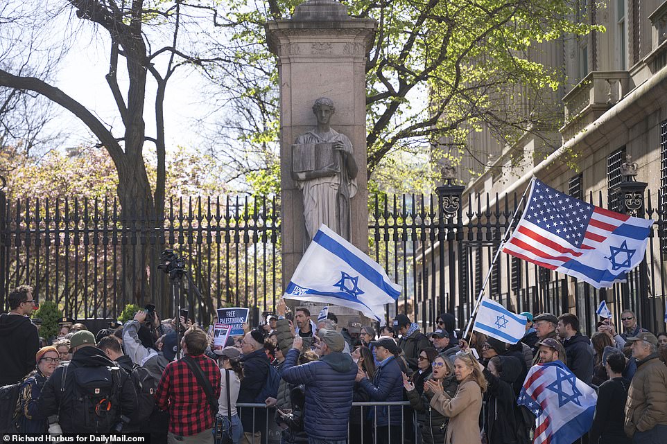 The atmosphere was much less peaceful outside, where Jewish protesters were told to stay back for their own safety.