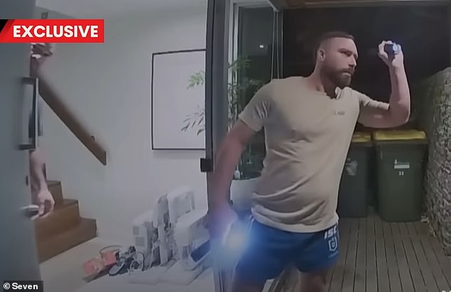 Julian Rivers-Smith, 33, confronted an armed gang after he invited a potential buyer to collect a laptop from his Melbourne home.  The confrontation was captured by the security cameras of his house.