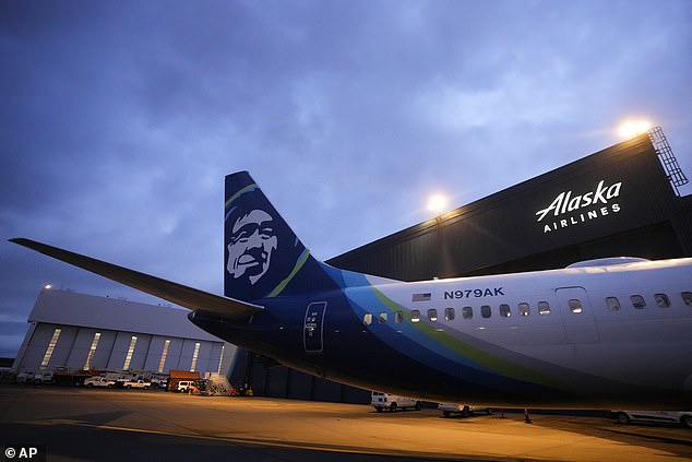 An Alaska Airlines Boeing 737 Max 9 awaits inspection in the airline's hangar at Seattle-Tacoma International Airport