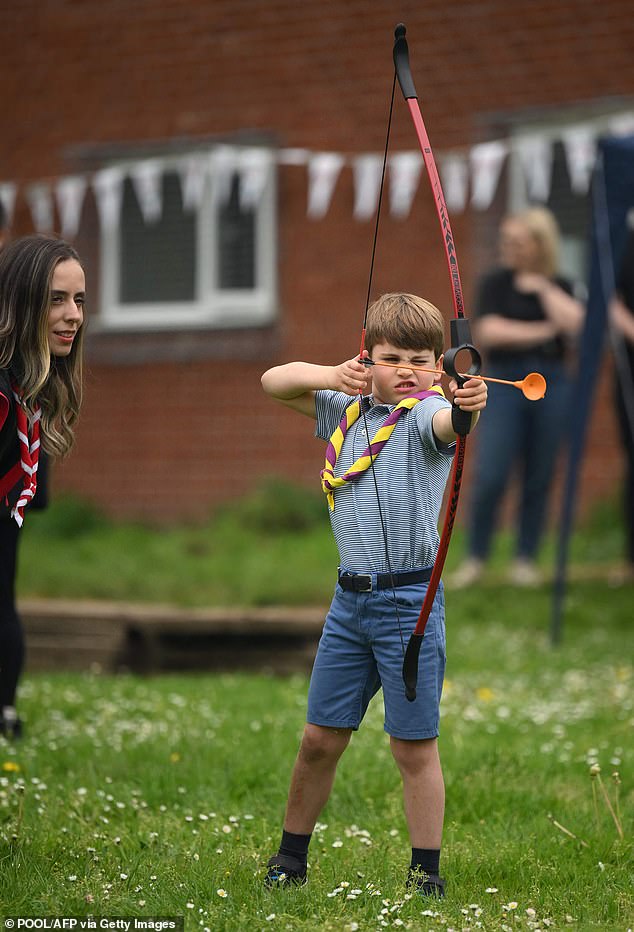 Prince Louis of Wales tried archery while taking part in the Big Help Out, during a visit to the third Upton Scouts hut in Slough, west London, in May 2023.