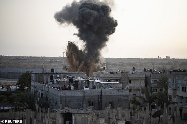 Smoke rises following Israeli attacks, amid the ongoing conflict between Israel and the Palestinian Islamist group Hamas.
