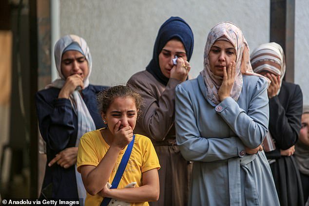 Relatives of Palestinians who lost their lives in an Israeli airstrike are in mourning