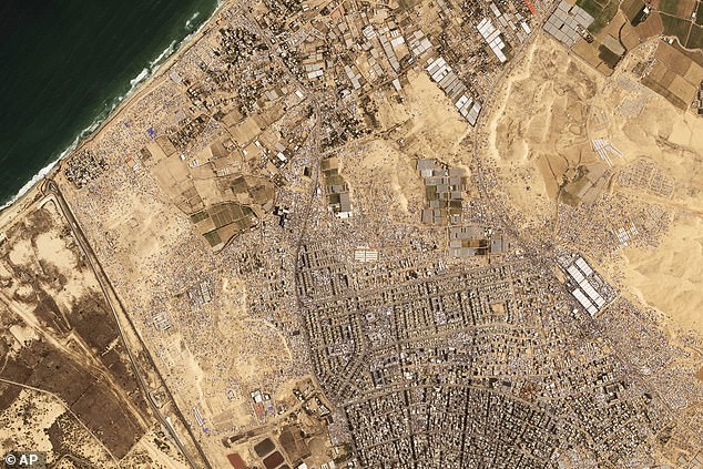 This satellite image from Planet Labs PBC shows tents and other makeshift housing built around the Tel al-Sultan refugee camp area on Saturday, April 20, 2024.
