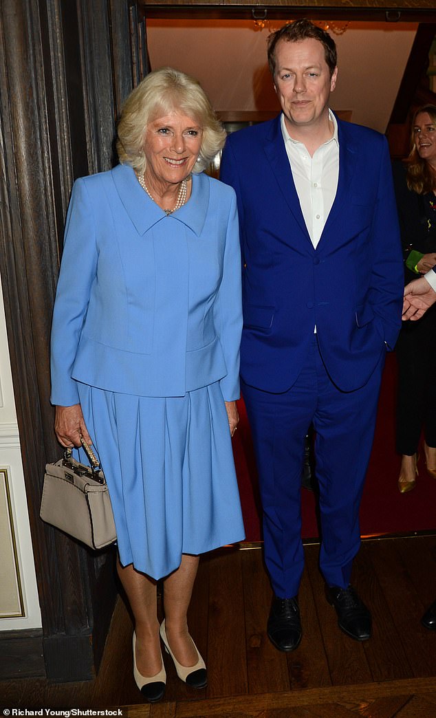 Tom is pictured with his mother Camilla Parker Bowles in 2018.