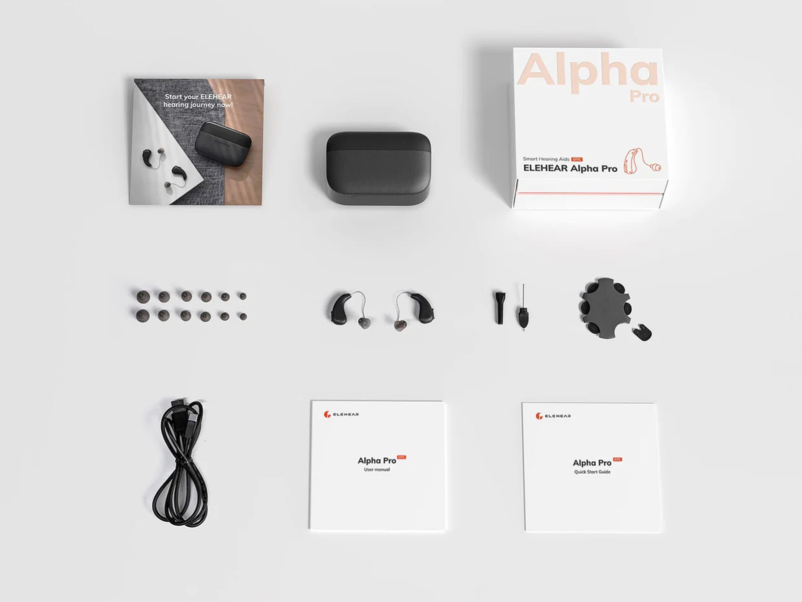 Overhead view of the headphone kit, including the headphone cushion case and instructions.