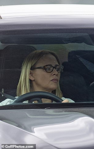 Kimberley embraced her natural look while also rocking a pair of glasses in a rare candid look.