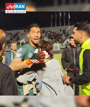 Footage showed the goalkeeper hugging a fan whose hijab had fallen from her head.