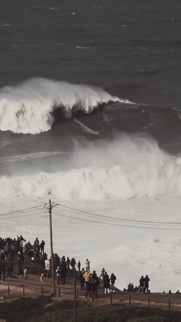 A crowd gathers in Nazaré, Portugal, as Steudtner was filmed making the record attempt in February.